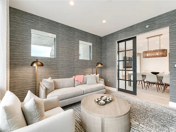 a living room with furniture and a table