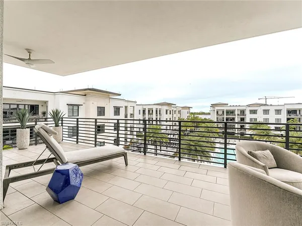 a view of a terrace with seating space