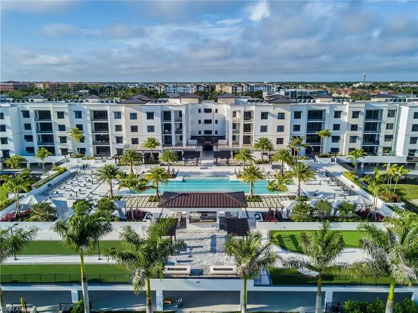 a view of building with outdoor seating