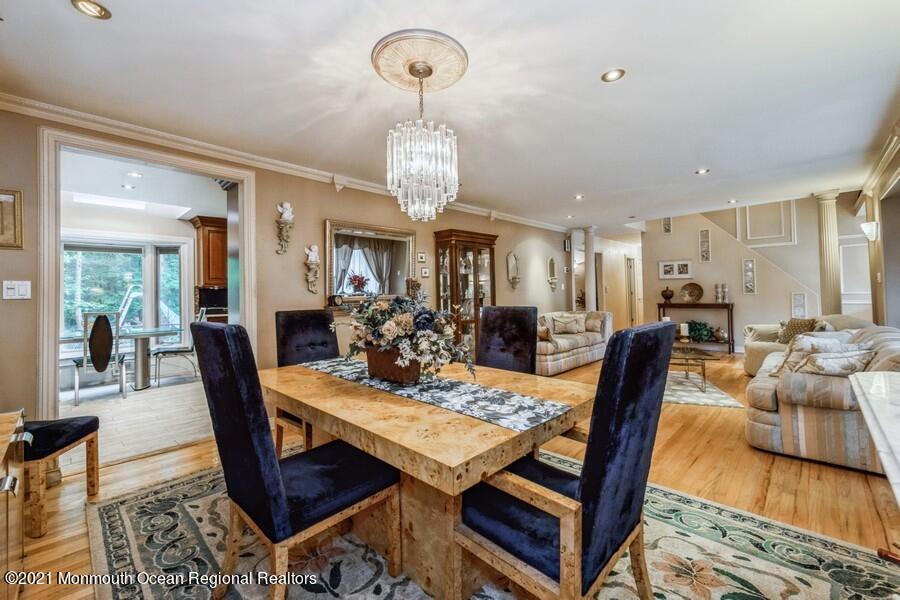 57 Millay Road Morganville, NJ 07751 - Photo 11 of 46 a view of a dining room with furniture