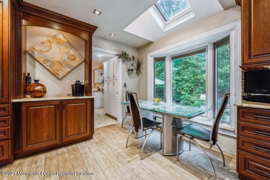57 Millay Road Morganville, NJ 07751 - Photo 13 of 46 a workspace with wooden floor and a window