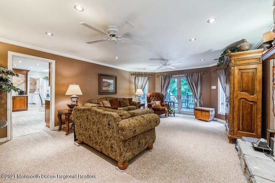 57 Millay Road Morganville, NJ 07751 - Photo 18 of 46 a bed room with furniture and a window