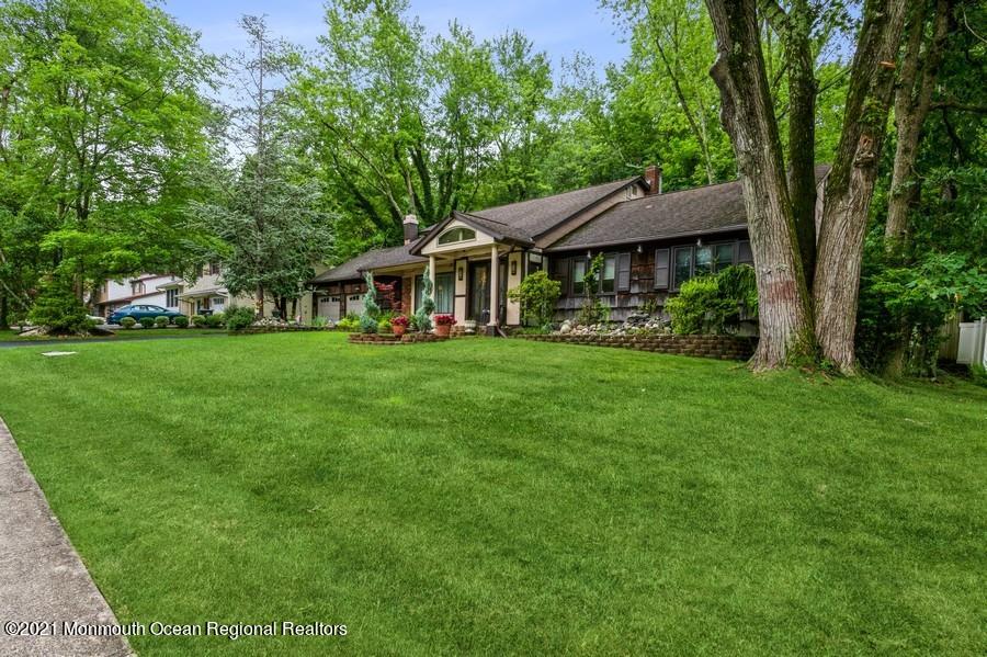 57 Millay Road Morganville, NJ 07751 - Photo 4 of 46 a view of a house with a yard