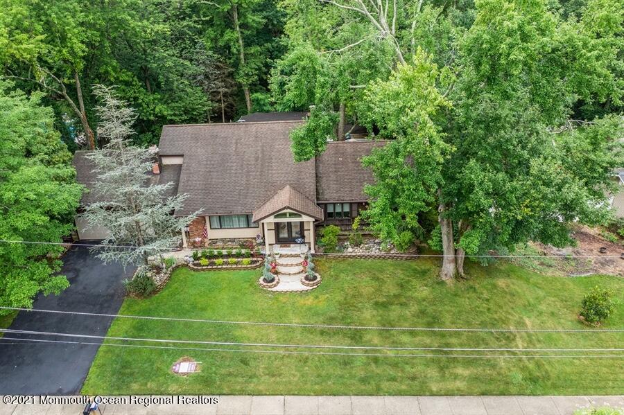 57 Millay Road Morganville, NJ 07751 - Photo 6 of 46 an aerial view of a house