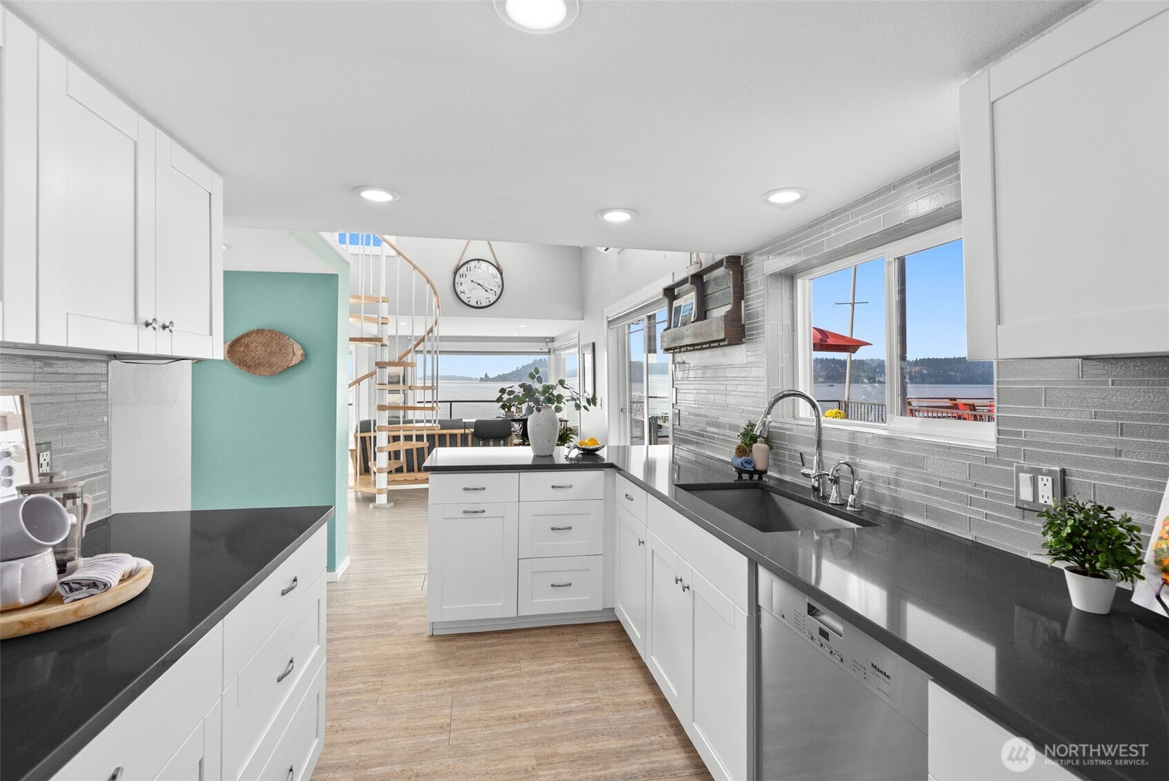 1542-1538 South Wilton Road Tacoma, WA 98466 - Photo 14 of 40 a kitchen with granite countertop a sink a stove cabinets and a counter top space