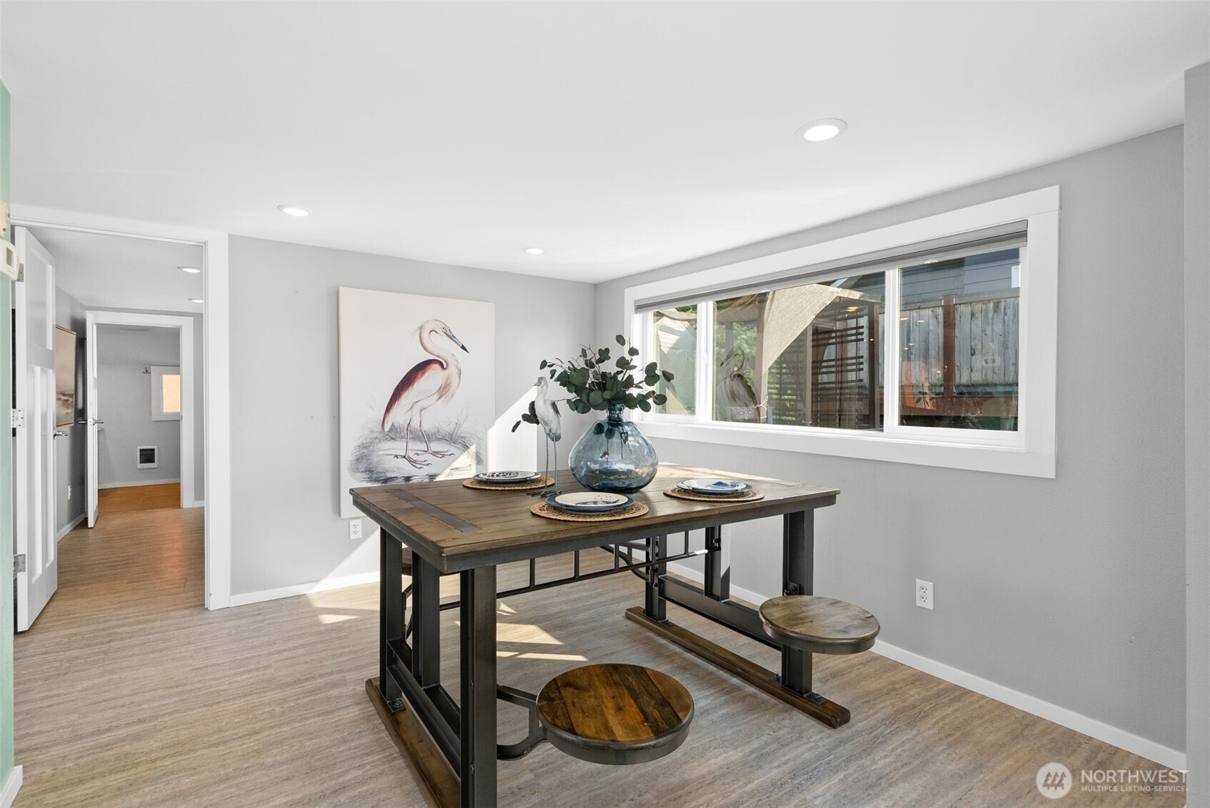 1542-1538 South Wilton Road Tacoma, WA 98466 - Photo 15 of 40 a view of a workspace with furniture and wooden floor