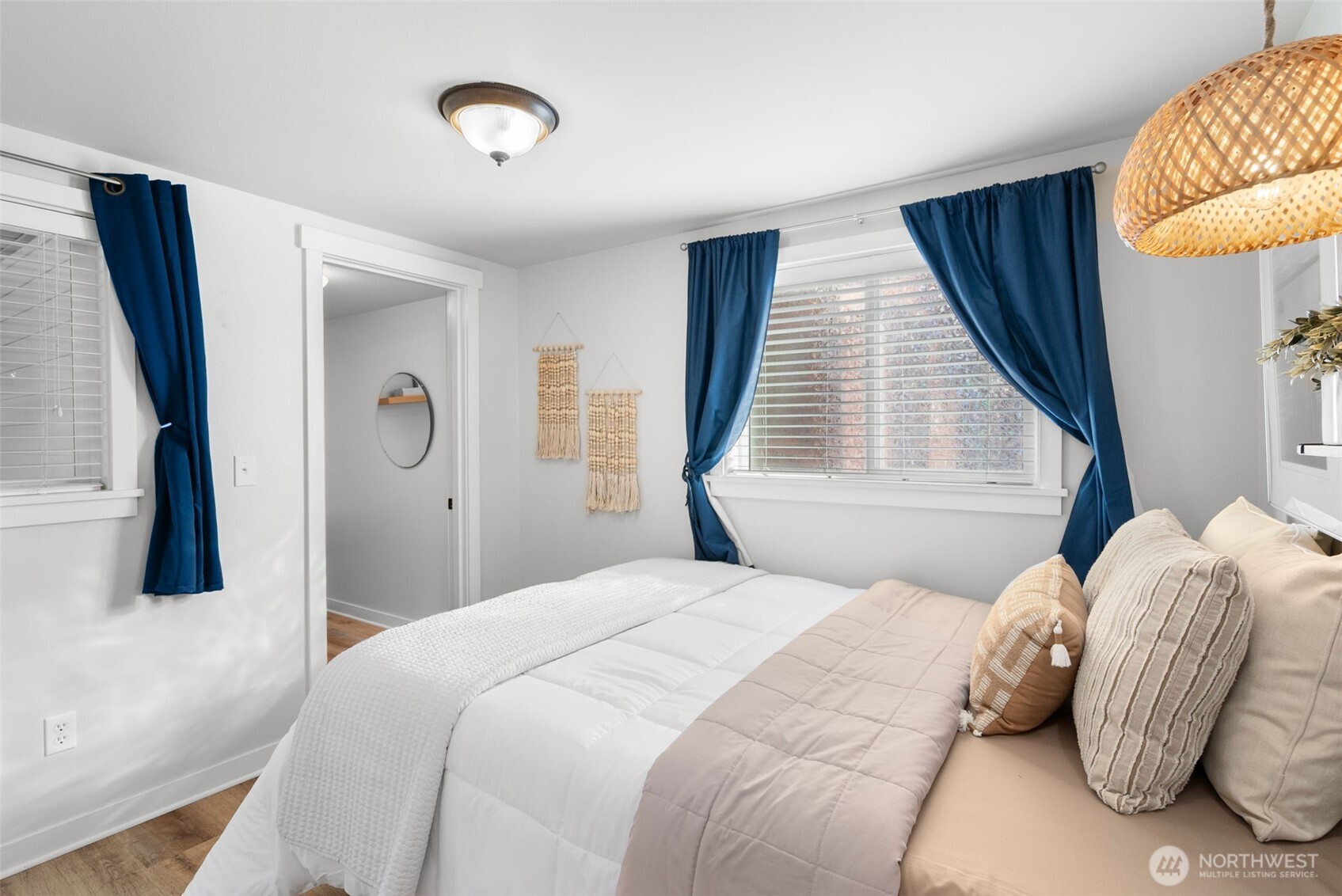 1542-1538 South Wilton Road Tacoma, WA 98466 - Photo 33 of 40 a bedroom with a bed and a window