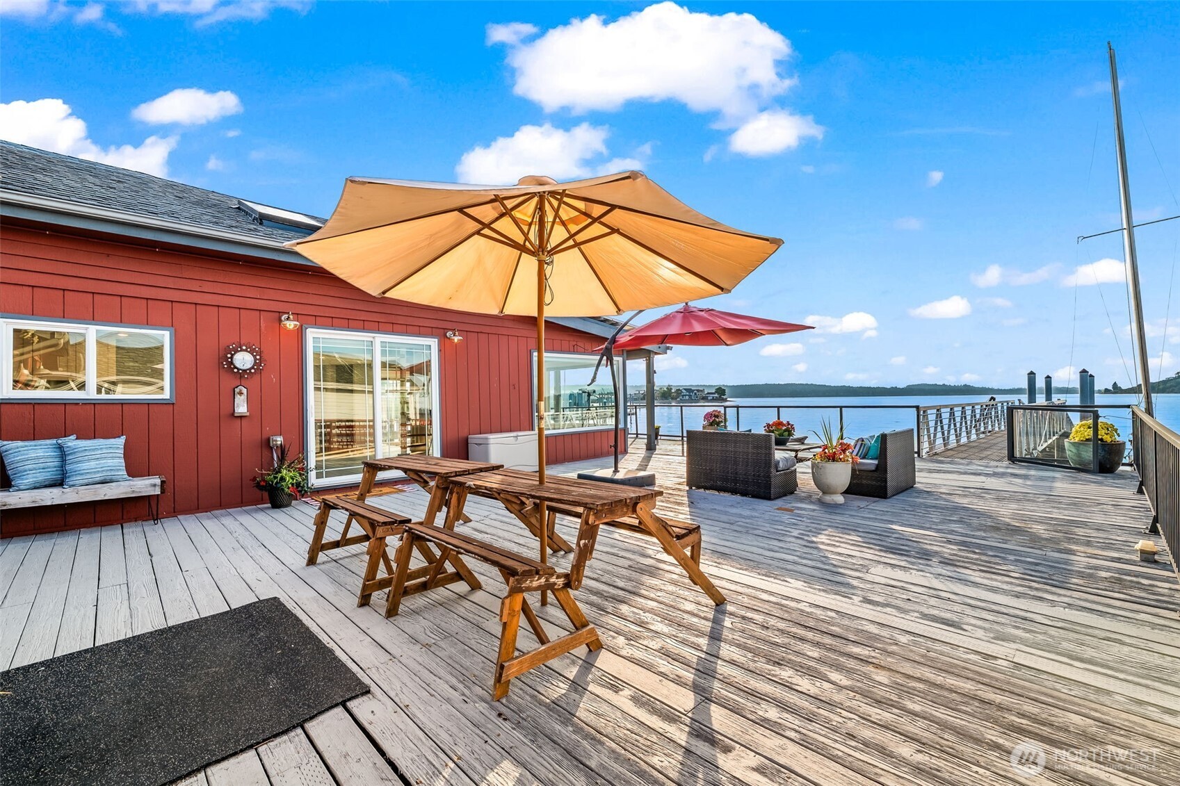 1542-1538 South Wilton Road Tacoma, WA 98466 - Photo 8 of 40 a view of a patio with table and chairs under an umbrella