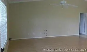 a kitchen with stainless steel appliances granite countertop a refrigerator and cabinets