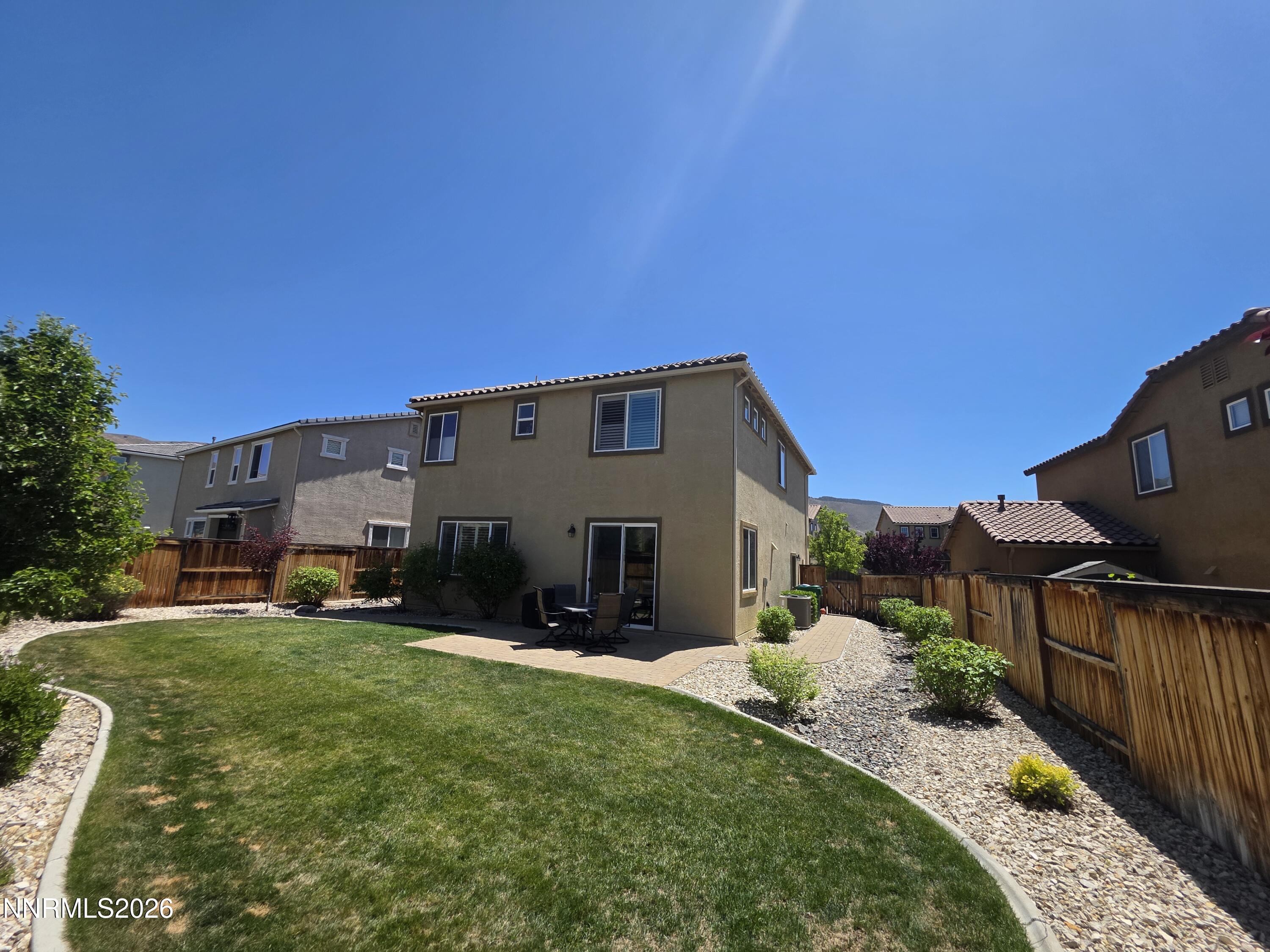 2775 Bonfire Lane Reno, NV 89521 - Photo 5 of 41 a view of a house with backyard and sitting area