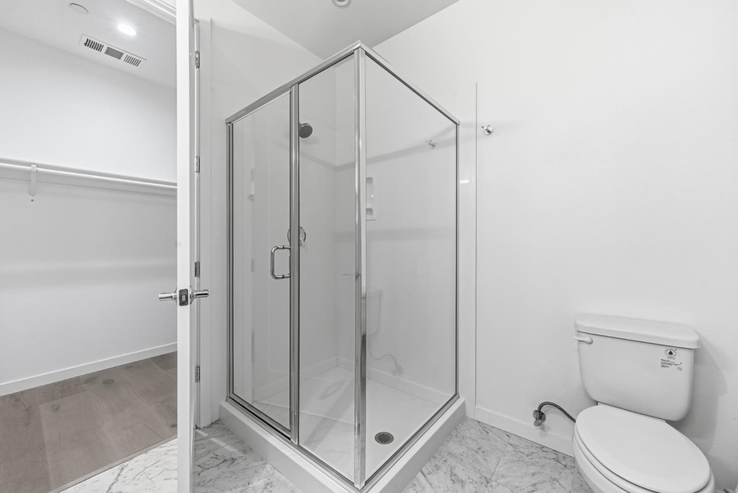 139 Flynn Avenue Mountain View, CA 94043 - Photo 17 of 34 a bathroom with a shower and toilet