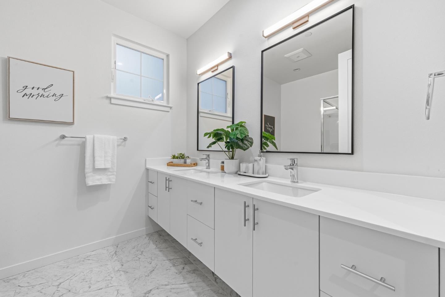 139 Flynn Avenue Mountain View, CA 94043 - Photo 18 of 34 a bathroom with a double vanity sink and mirror