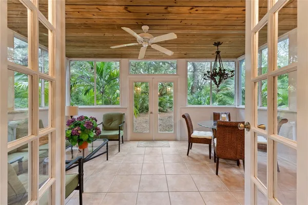 a view of entryway with wooden floor and a potted plant