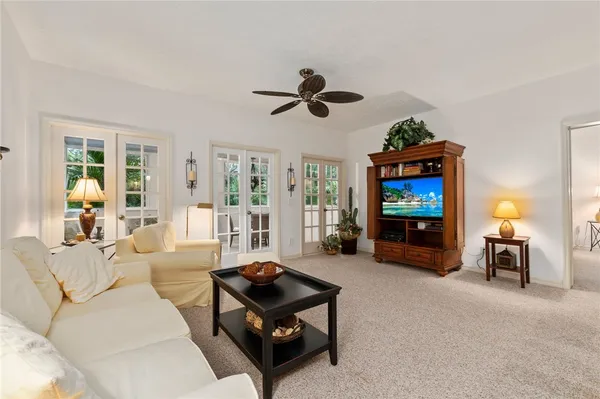 a kitchen with stainless steel appliances granite countertop a sink and a refrigerator