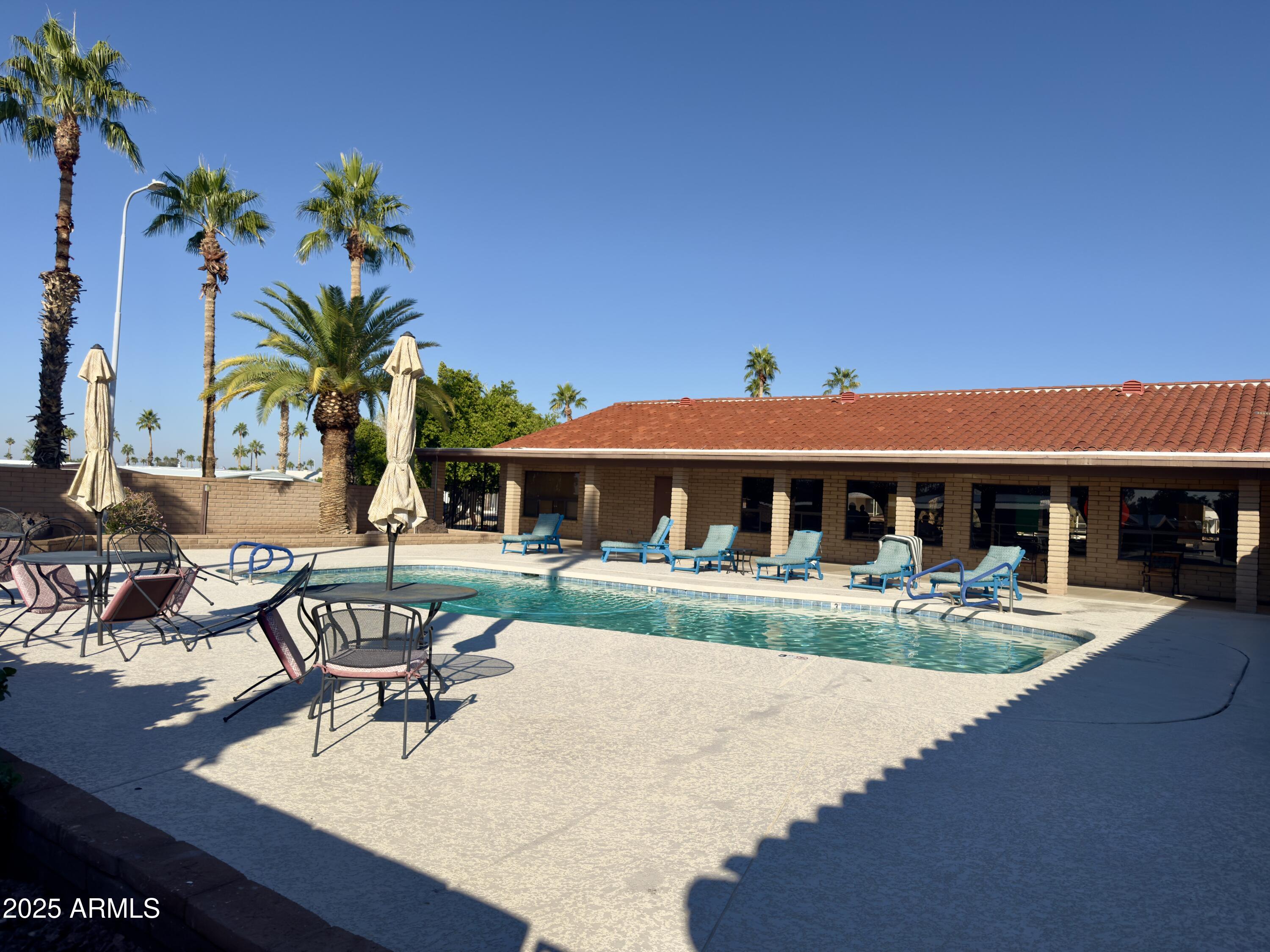 1855 West Southern Avenue, Unit 331 Apache Junction, AZ 85120 - Photo 13 of 13 a view of a house with pool and sitting area