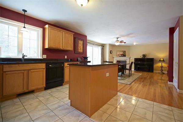 109 Breakneck Road Sturbridge, MA 01566 - Photo 11 of 30 a kitchen with stainless steel appliances granite countertop a sink counter space cabinets and a large window