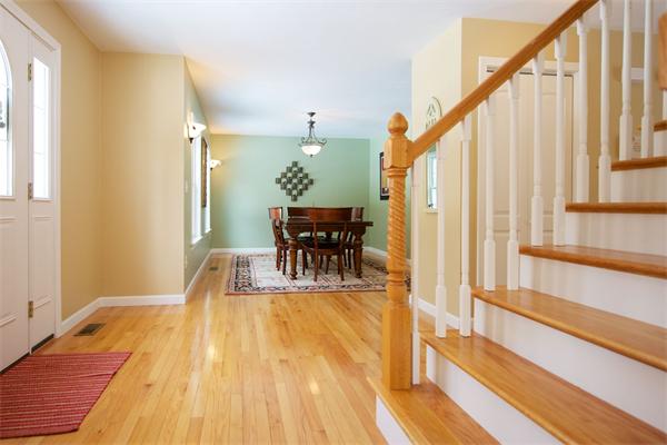 109 Breakneck Road Sturbridge, MA 01566 - Photo 20 of 30 a view of a dining room with furniture the chandelier and wooden floor