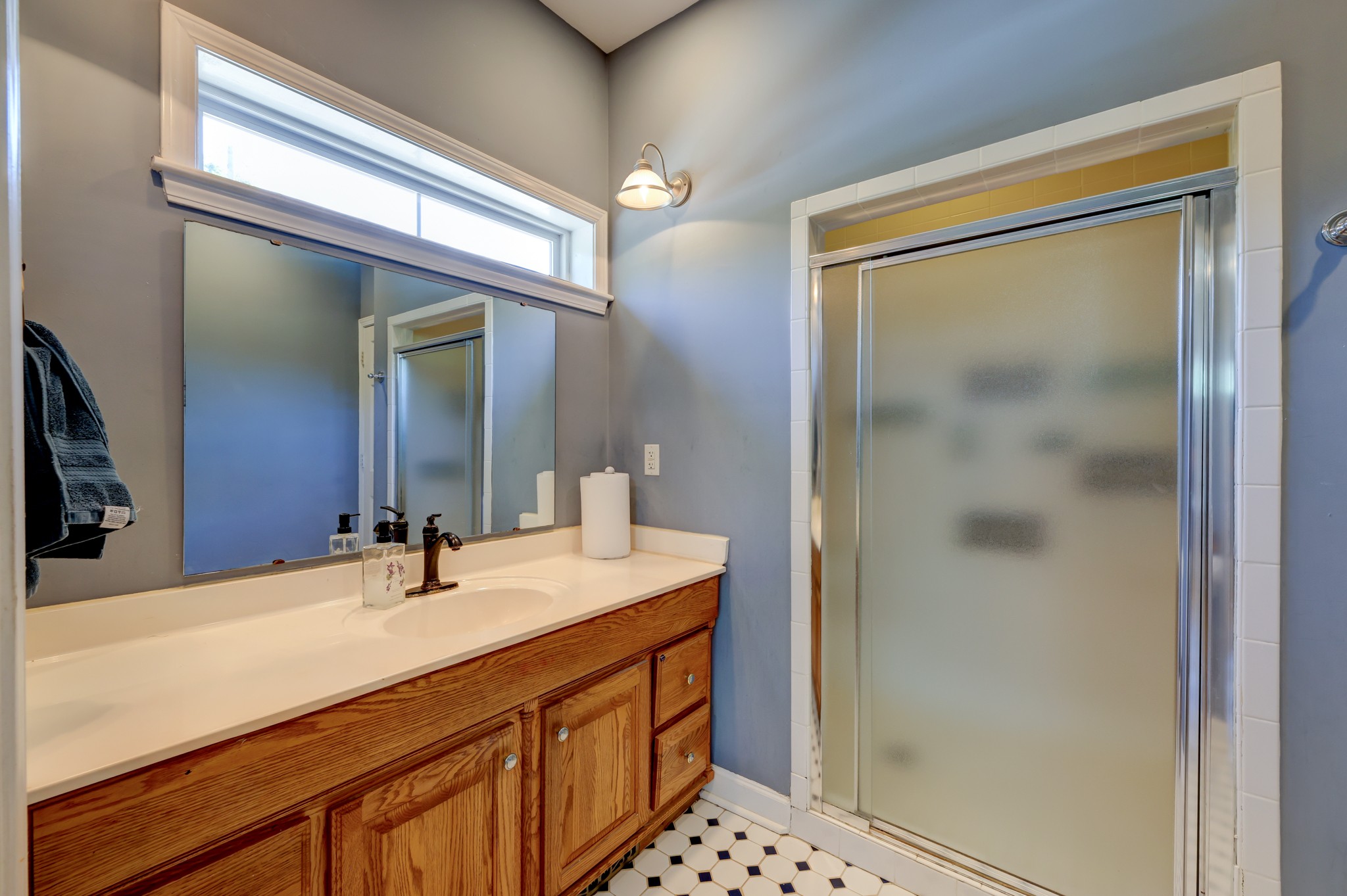 2251 Davidson Graveyard Road Clarksville, TN 37043 - Photo 48 of 78 a bathroom with a sink and a mirror