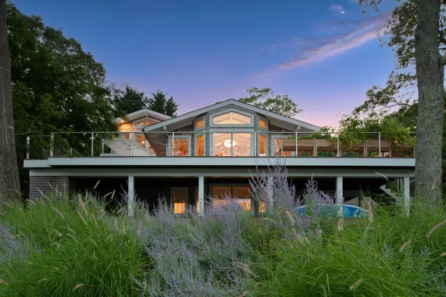 a view of a house with roof deck