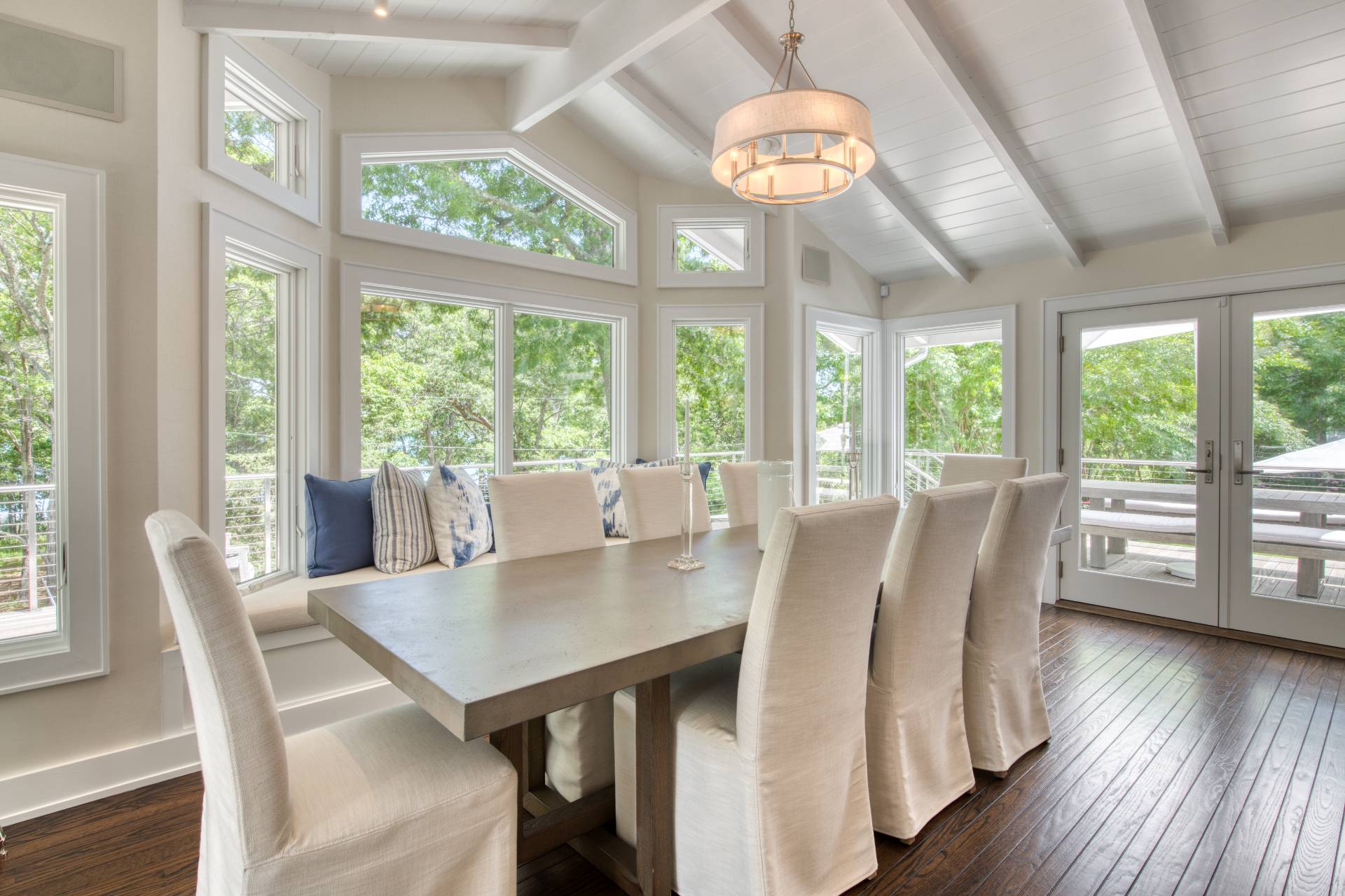 30 Springwood Way East Hampton, NY 11937 - Photo 11 of 32 a view of a dining room with furniture window and wooden floor