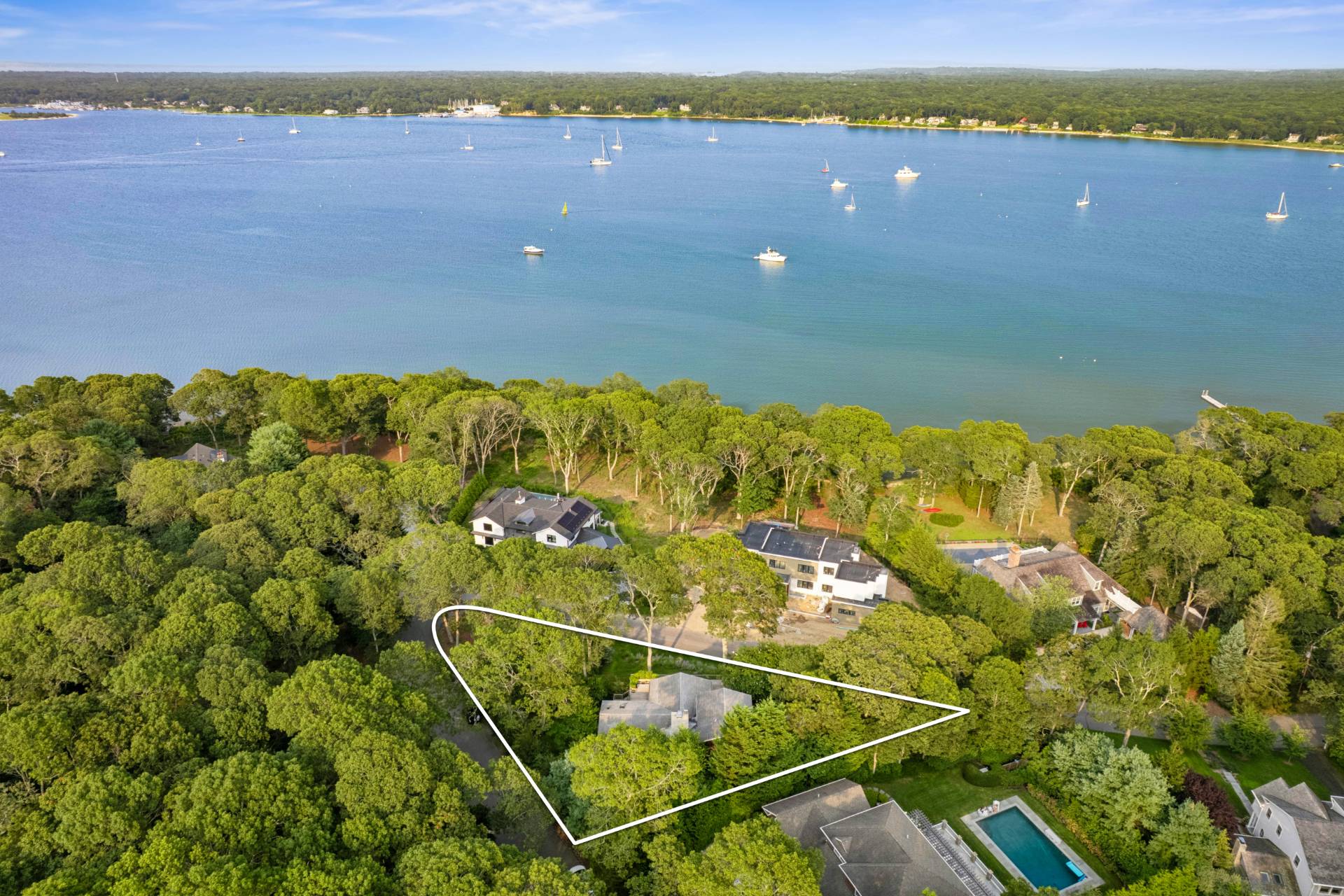30 Springwood Way East Hampton, NY 11937 - Photo 2 of 32 a view of a lake