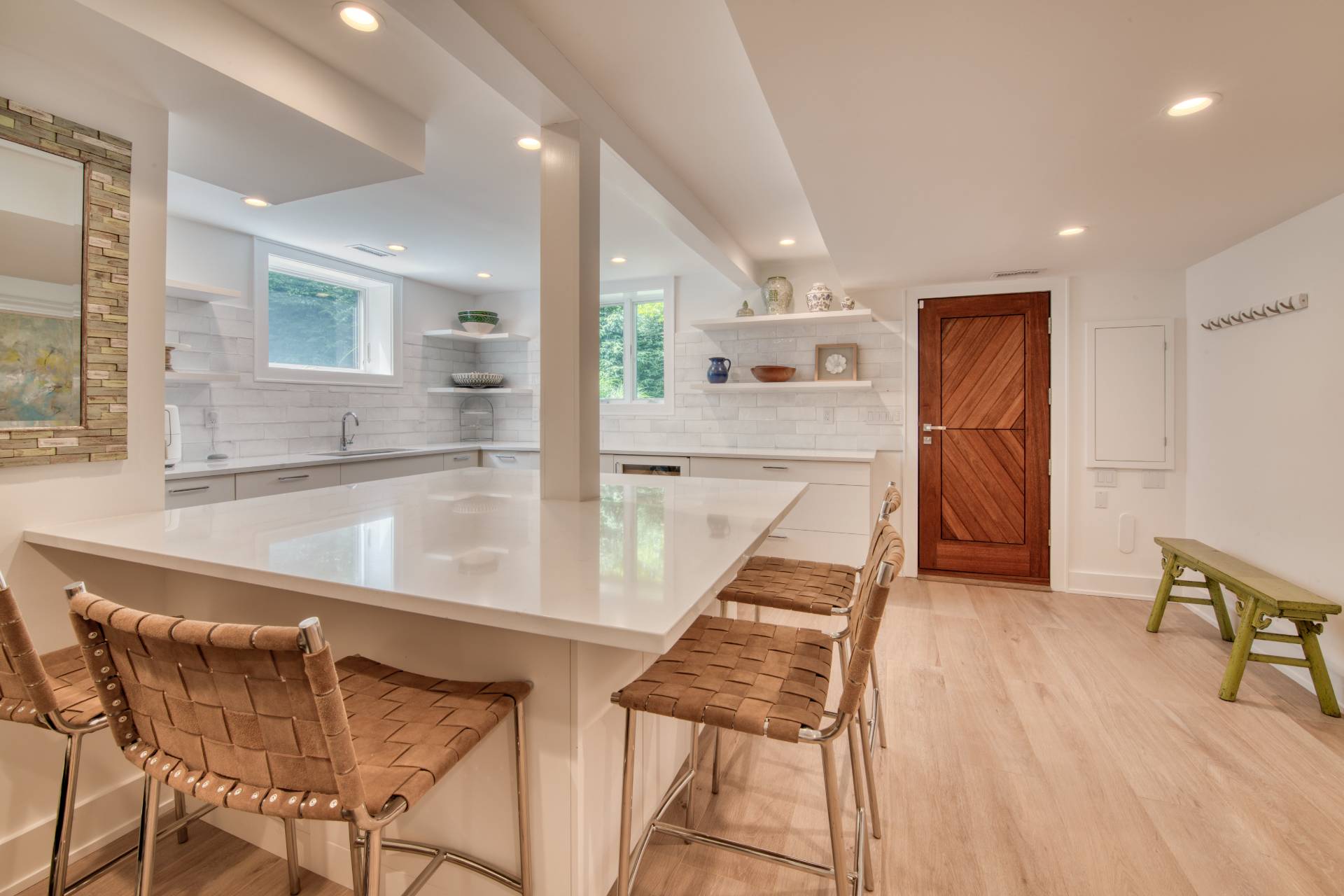 30 Springwood Way East Hampton, NY 11937 - Photo 21 of 32 a kitchen with stainless steel appliances granite countertop a sink and a refrigerator