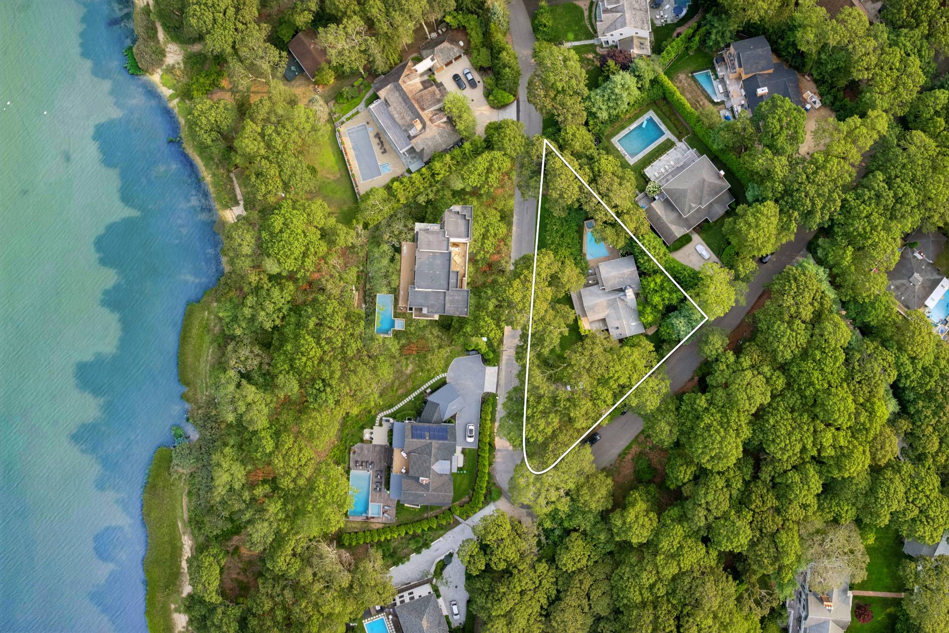 30 Springwood Way East Hampton, NY 11937 - Photo 3 of 32 an aerial view of a residential houses