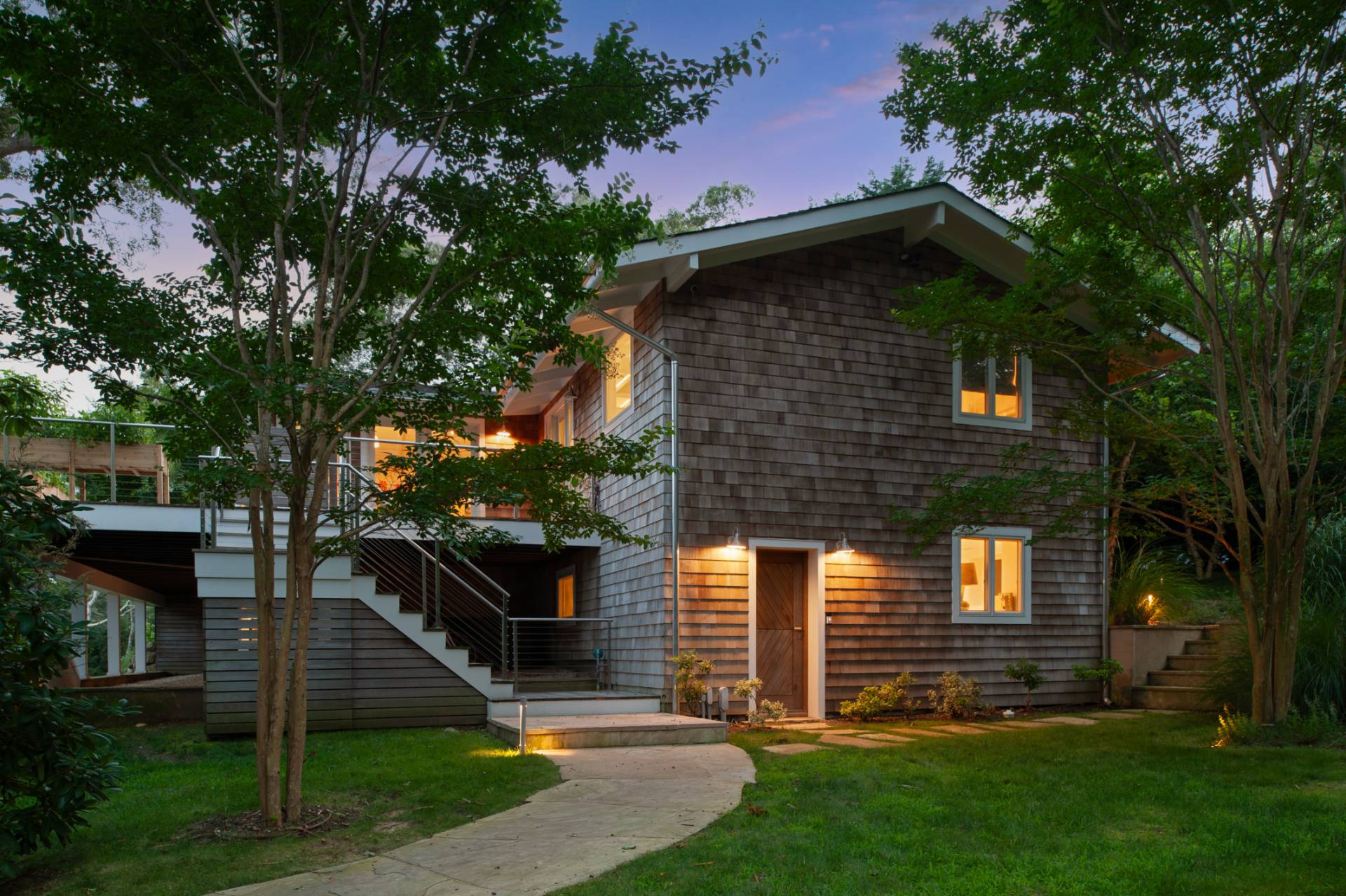 30 Springwood Way East Hampton, NY 11937 - Photo 31 of 32 a front view of a house with garden