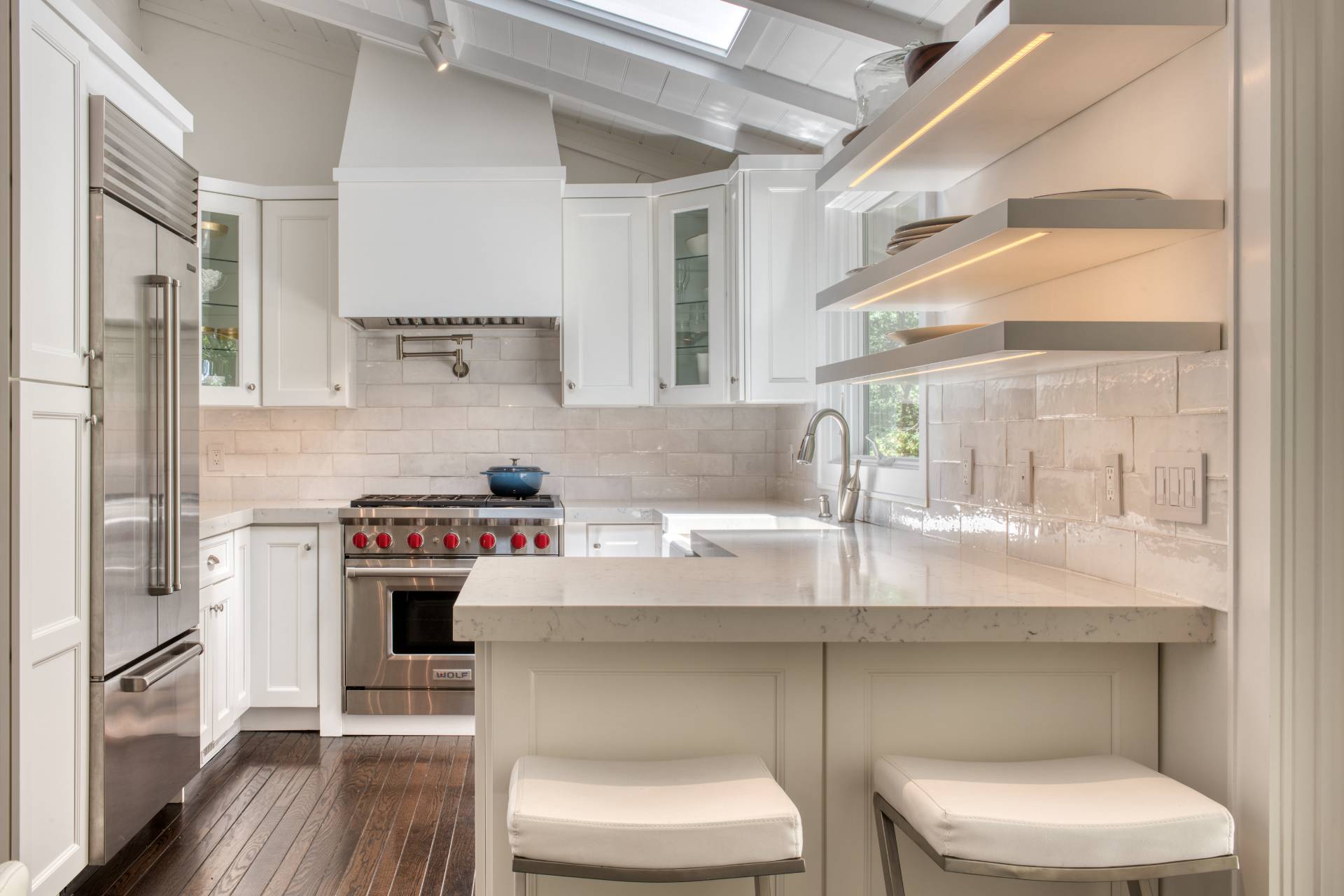 30 Springwood Way East Hampton, NY 11937 - Photo 10 of 32 a kitchen with a sink a stove and a wooden floors