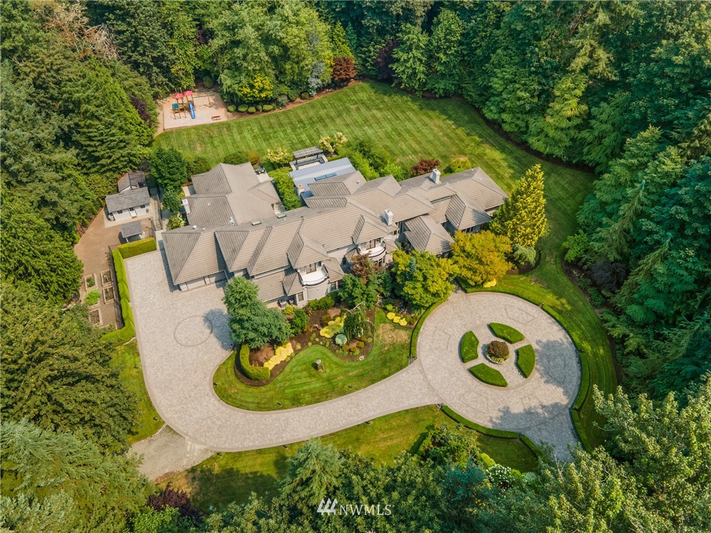 26630 Southeast Issaquah-Fall City Road Issaquah, WA 98029 - Photo 1 of 40 an aerial view of a house with a swimming pool