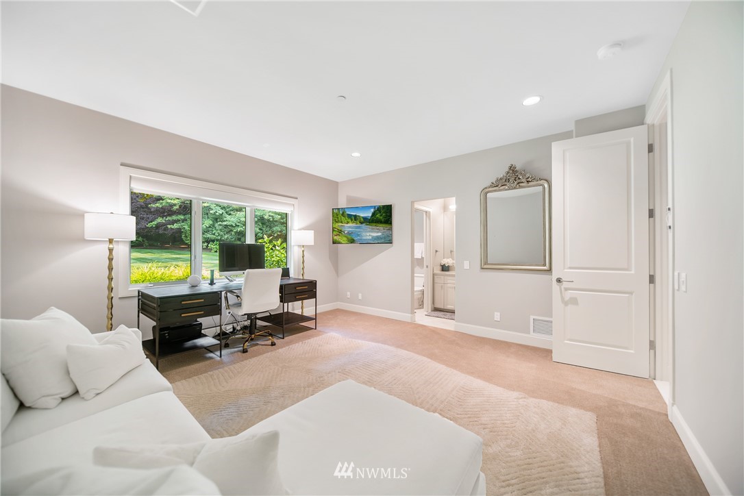26630 Southeast Issaquah-Fall City Road Issaquah, WA 98029 - Photo 11 of 40 a living room with furniture a large window and a chandelier