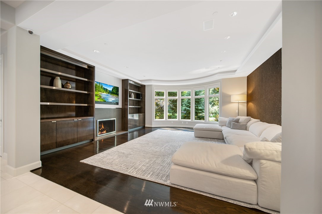 26630 Southeast Issaquah-Fall City Road Issaquah, WA 98029 - Photo 13 of 40 a living room with furniture a large window and flat screen tv