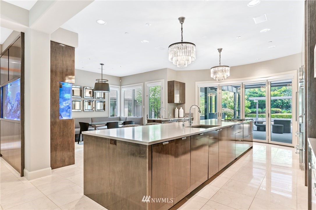 26630 Southeast Issaquah-Fall City Road Issaquah, WA 98029 - Photo 14 of 40 a large kitchen with kitchen island and a large window