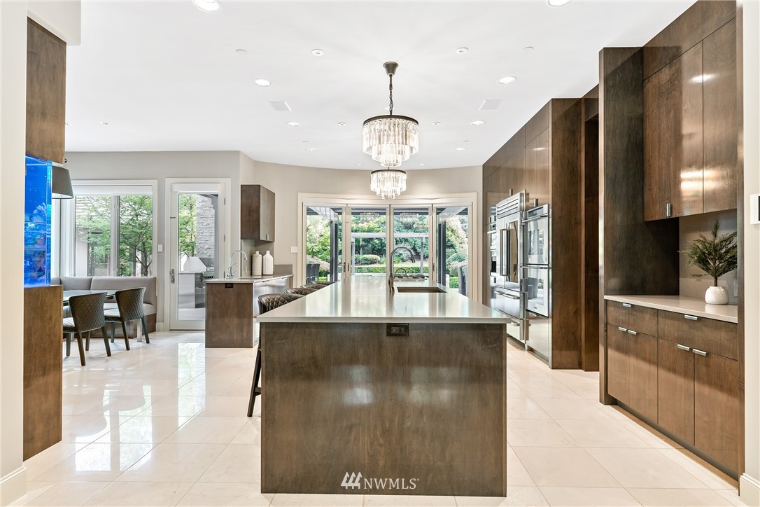 26630 Southeast Issaquah-Fall City Road Issaquah, WA 98029 - Photo 15 of 40 a view of a living room and kitchen with windows