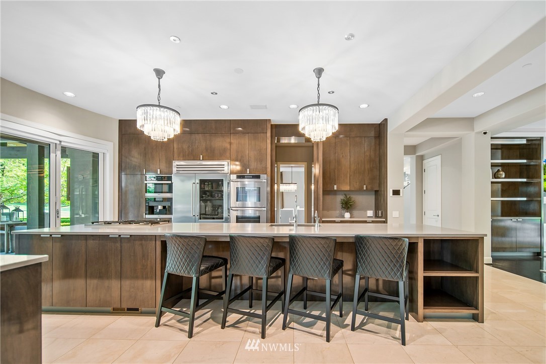 26630 Southeast Issaquah-Fall City Road Issaquah, WA 98029 - Photo 17 of 40 a large kitchen with a table and chairs