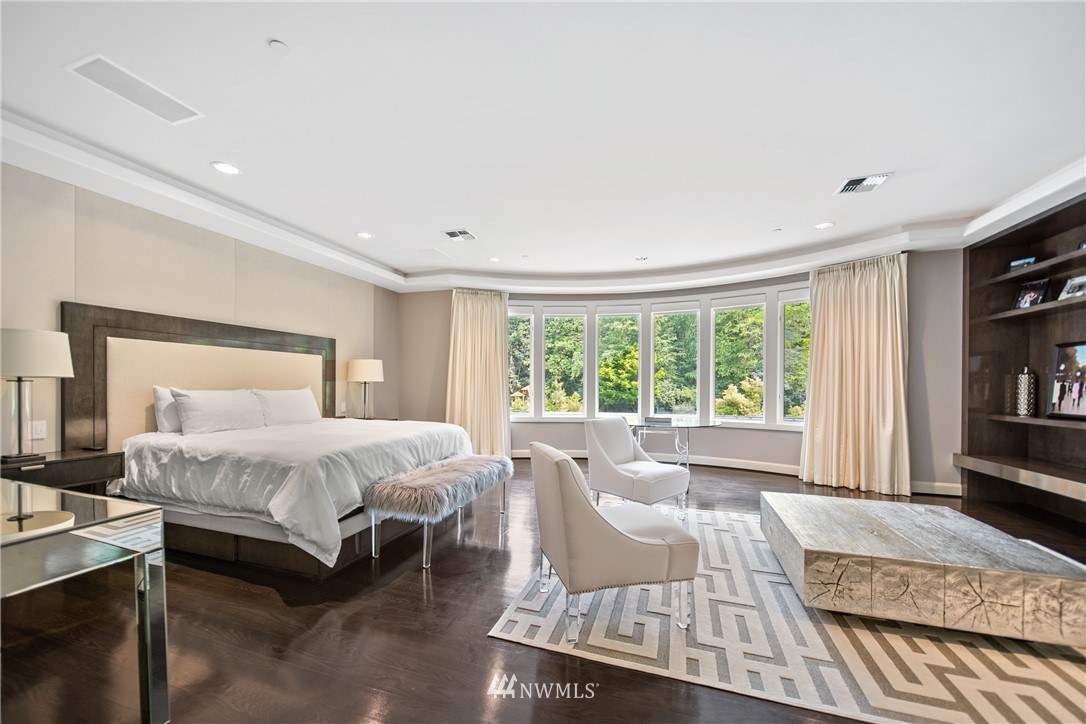 26630 Southeast Issaquah-Fall City Road Issaquah, WA 98029 - Photo 25 of 40 a spacious bedroom with a bed and a large window