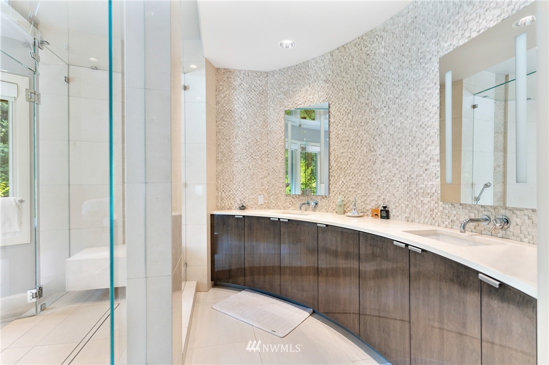 26630 Southeast Issaquah-Fall City Road Issaquah, WA 98029 - Photo 28 of 40 a bathroom with a sink and a mirror