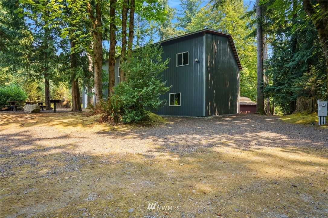 26630 Southeast Issaquah-Fall City Road Issaquah, WA 98029 - Photo 33 of 40 a view of a house with backyard and trees