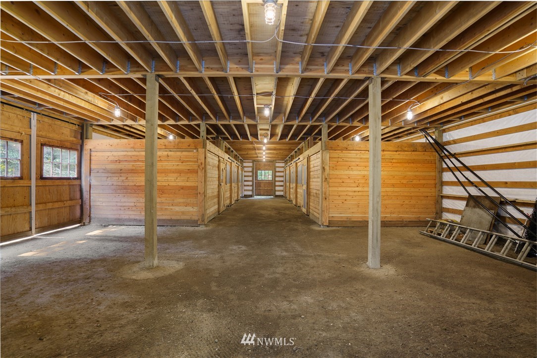 26630 Southeast Issaquah-Fall City Road Issaquah, WA 98029 - Photo 36 of 40 a view of an empty room with wooden walls