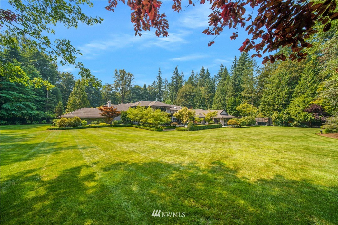 26630 Southeast Issaquah-Fall City Road Issaquah, WA 98029 - Photo 38 of 40 a view of a swimming pool with an outdoor space and seating area