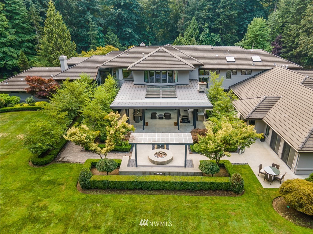 26630 Southeast Issaquah-Fall City Road Issaquah, WA 98029 - Photo 39 of 40 a view of house with garden space and a patio