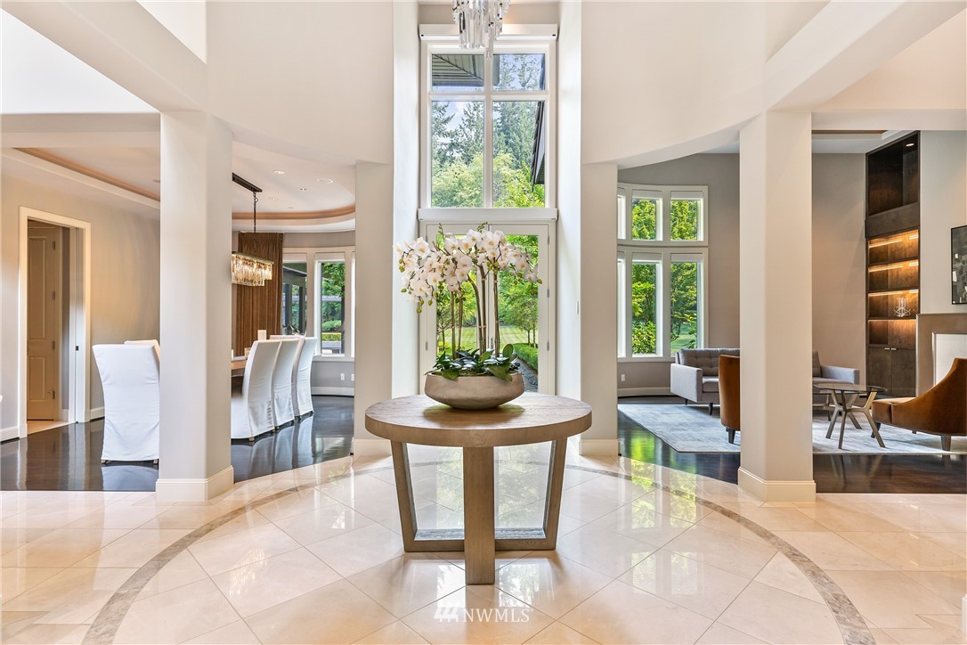 26630 Southeast Issaquah-Fall City Road Issaquah, WA 98029 - Photo 5 of 40 a room with furniture and large windows