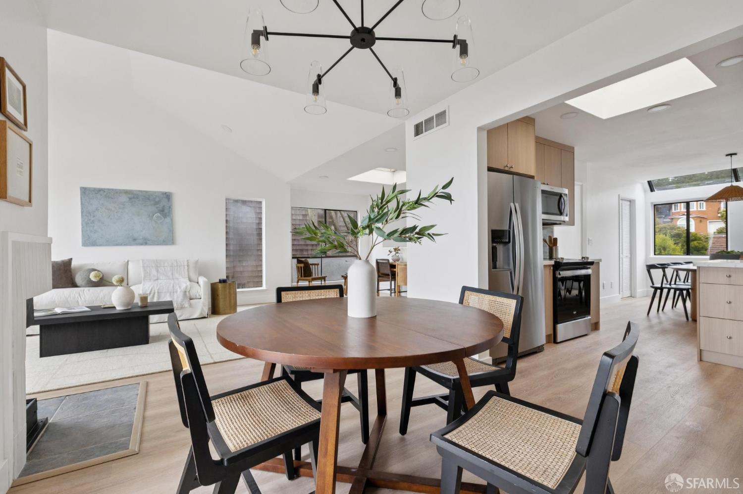 274 Beachview Avenue, Unit 16 Pacifica, CA 94044 - Photo 25 of 81 a view of a dining room with furniture and wooden floor
