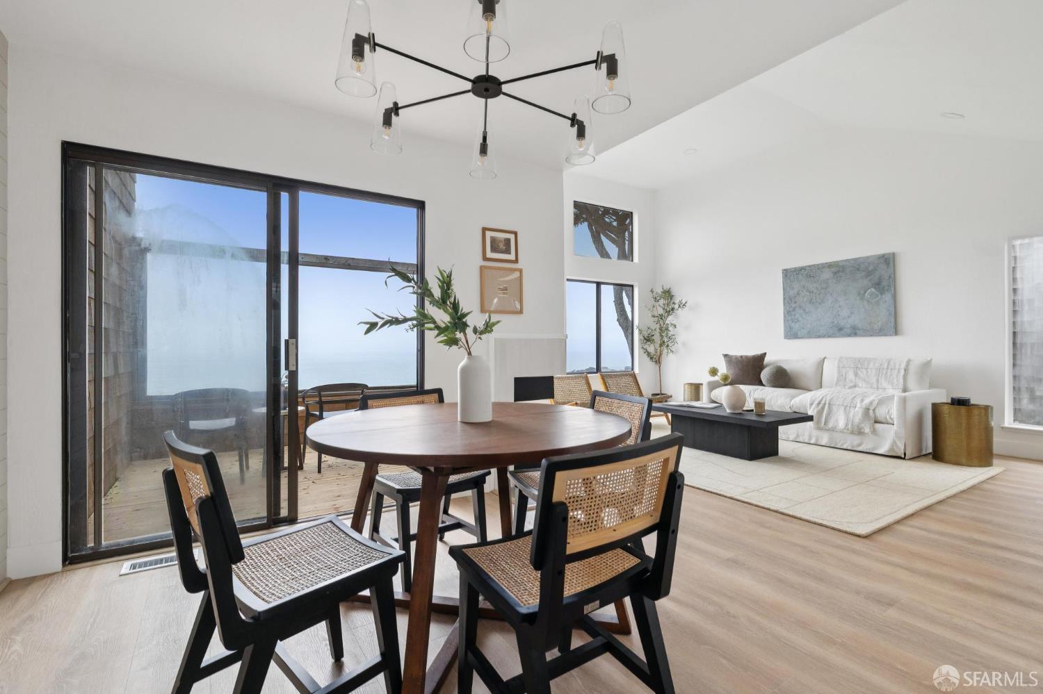 274 Beachview Avenue, Unit 16 Pacifica, CA 94044 - Photo 37 of 81 a view of a dining room with furniture and wooden floor