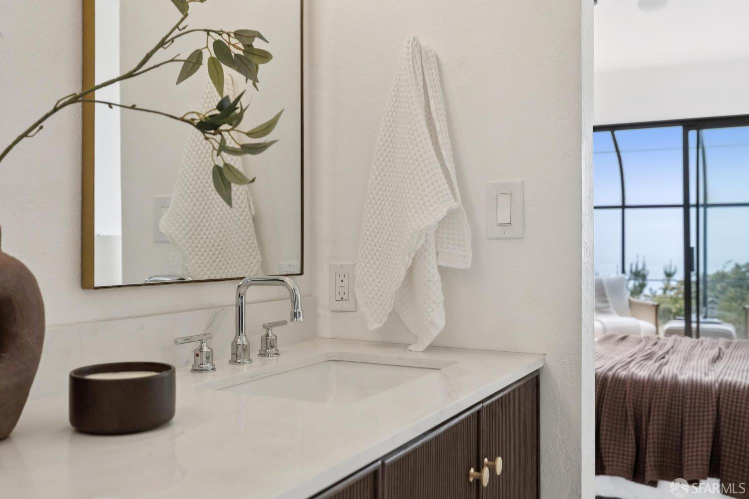 274 Beachview Avenue, Unit 16 Pacifica, CA 94044 - Photo 61 of 81 a bathroom with a sink and a mirror