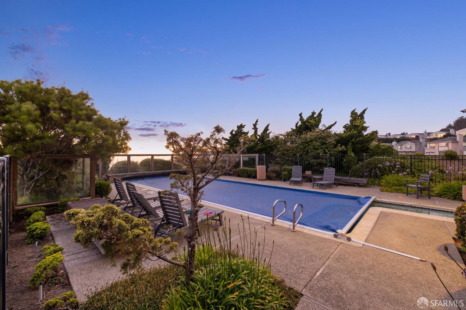274 Beachview Avenue, Unit 16 Pacifica, CA 94044 - Photo 80 of 81 a view of a swimming pool with a patio