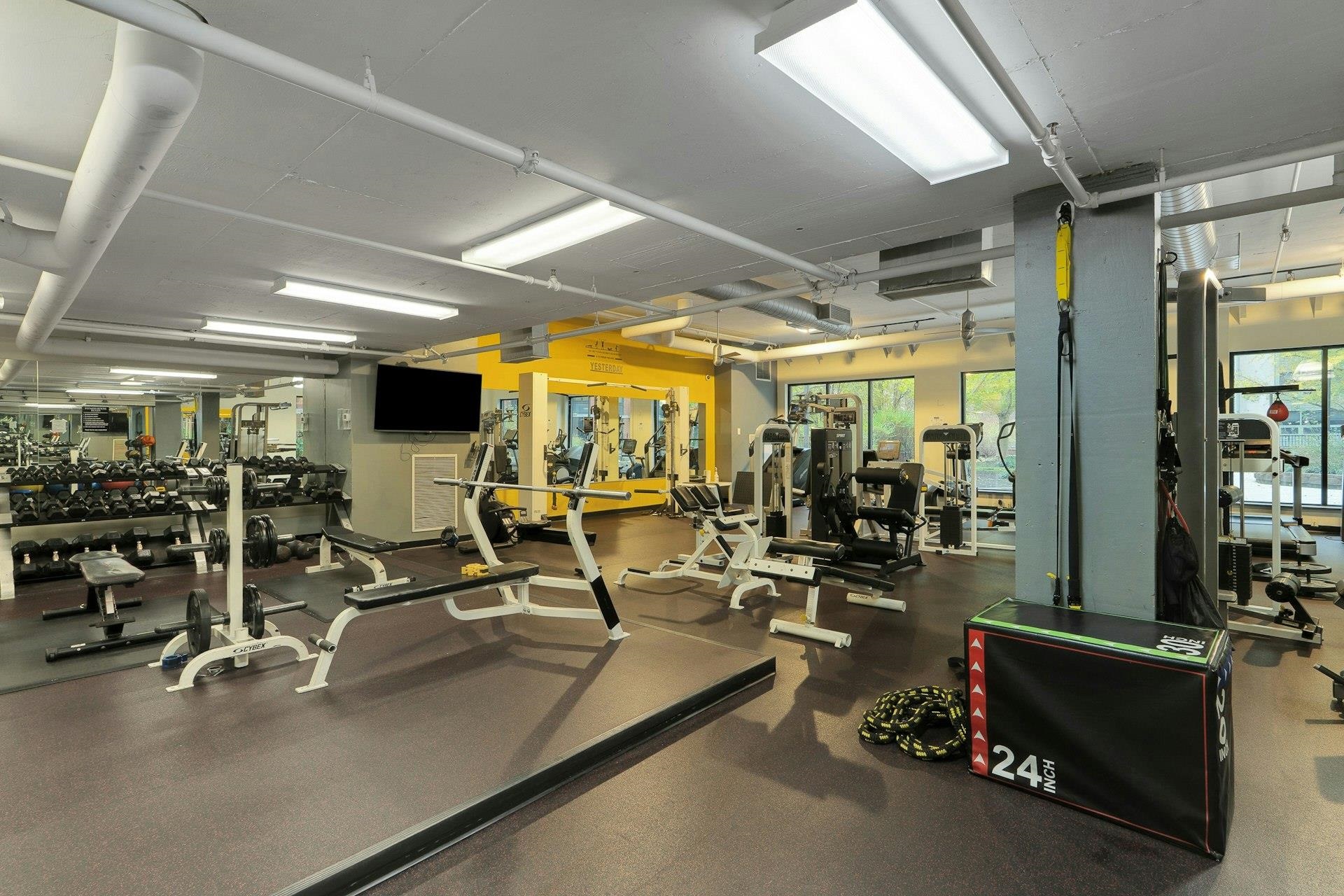 700 Grove Street, Unit 4V Jersey City, NJ 07310 - Photo 18 of 25 a view of a room with gym equipment