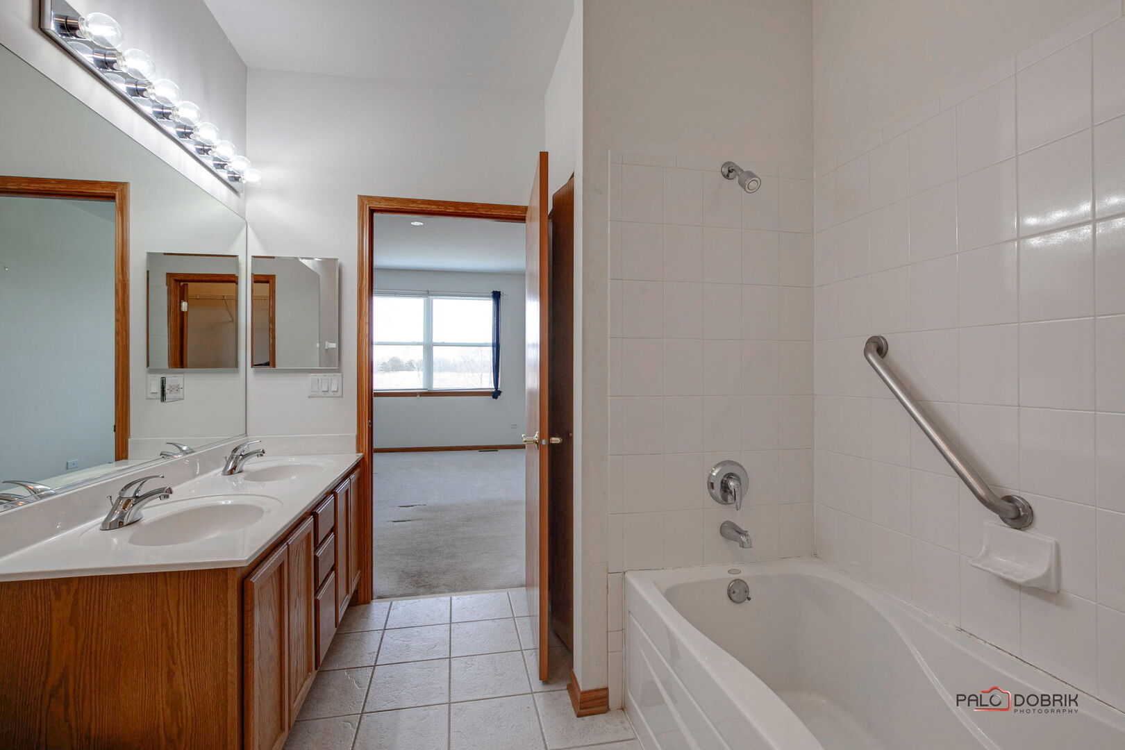 269 Enfield Lane Grayslake, IL 60030 - Photo 18 of 45 a spacious bathroom with a tub sink and mirror
