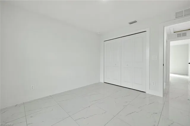 an empty room with a natural light