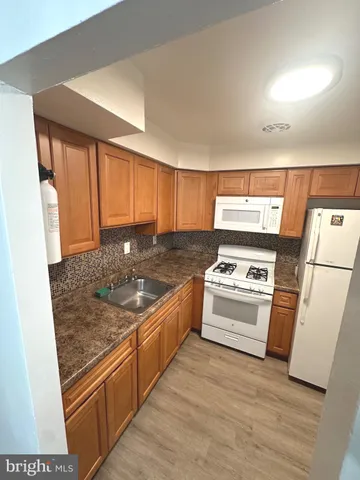 a bathroom with a toilet and a sink